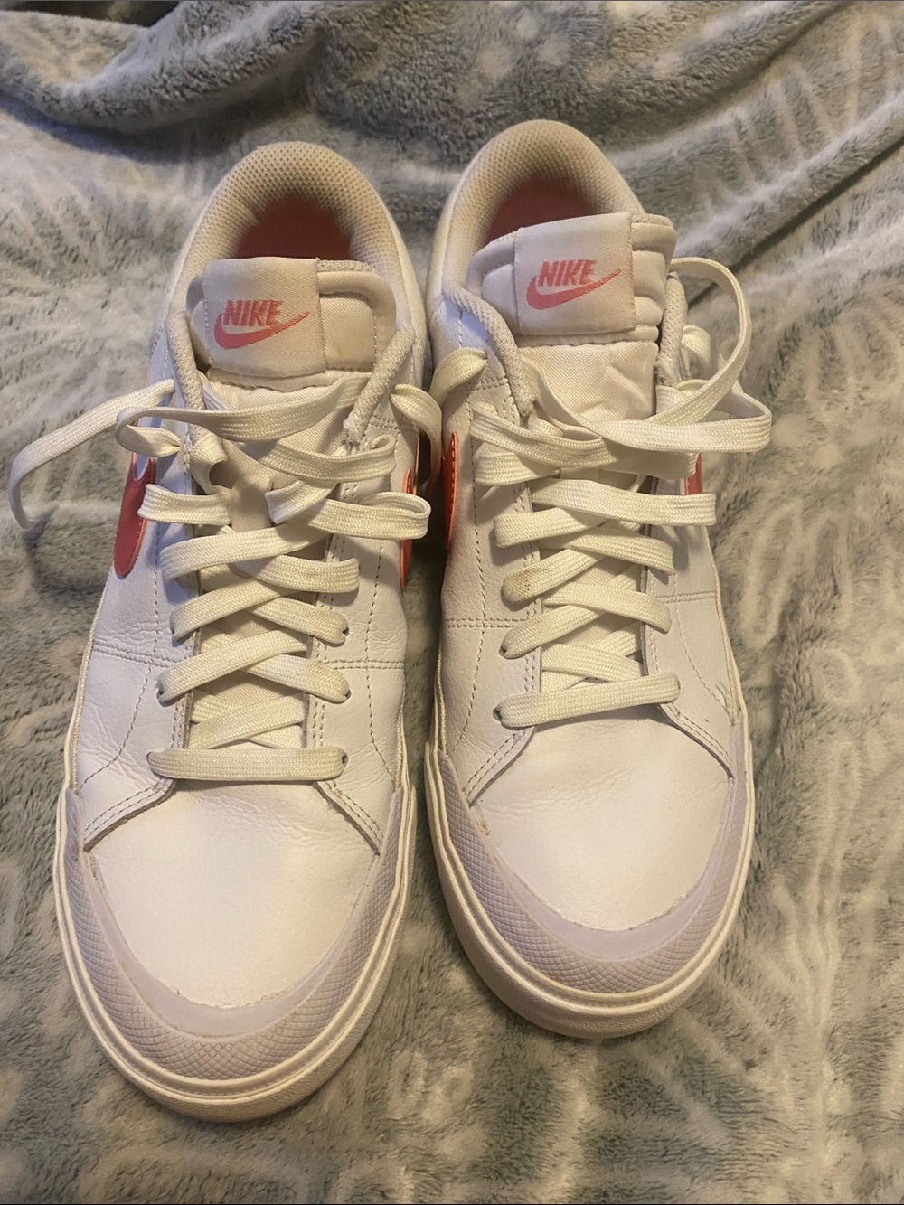 Nike White Low-Top Sneakers with Pink Swoosh